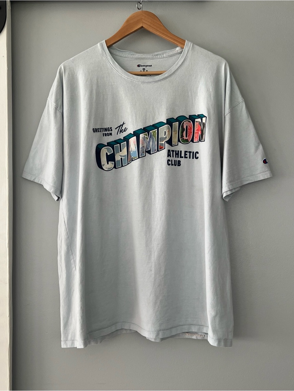 Champion Greetings Logo Graphic Short Sleeve T-Shirt Light Blue Men’s 2XL Skater